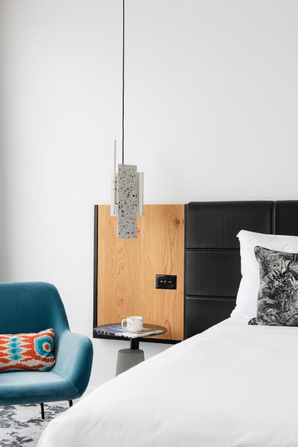 Ebb-דנידין מראה חיצוני תמונה A pendant light